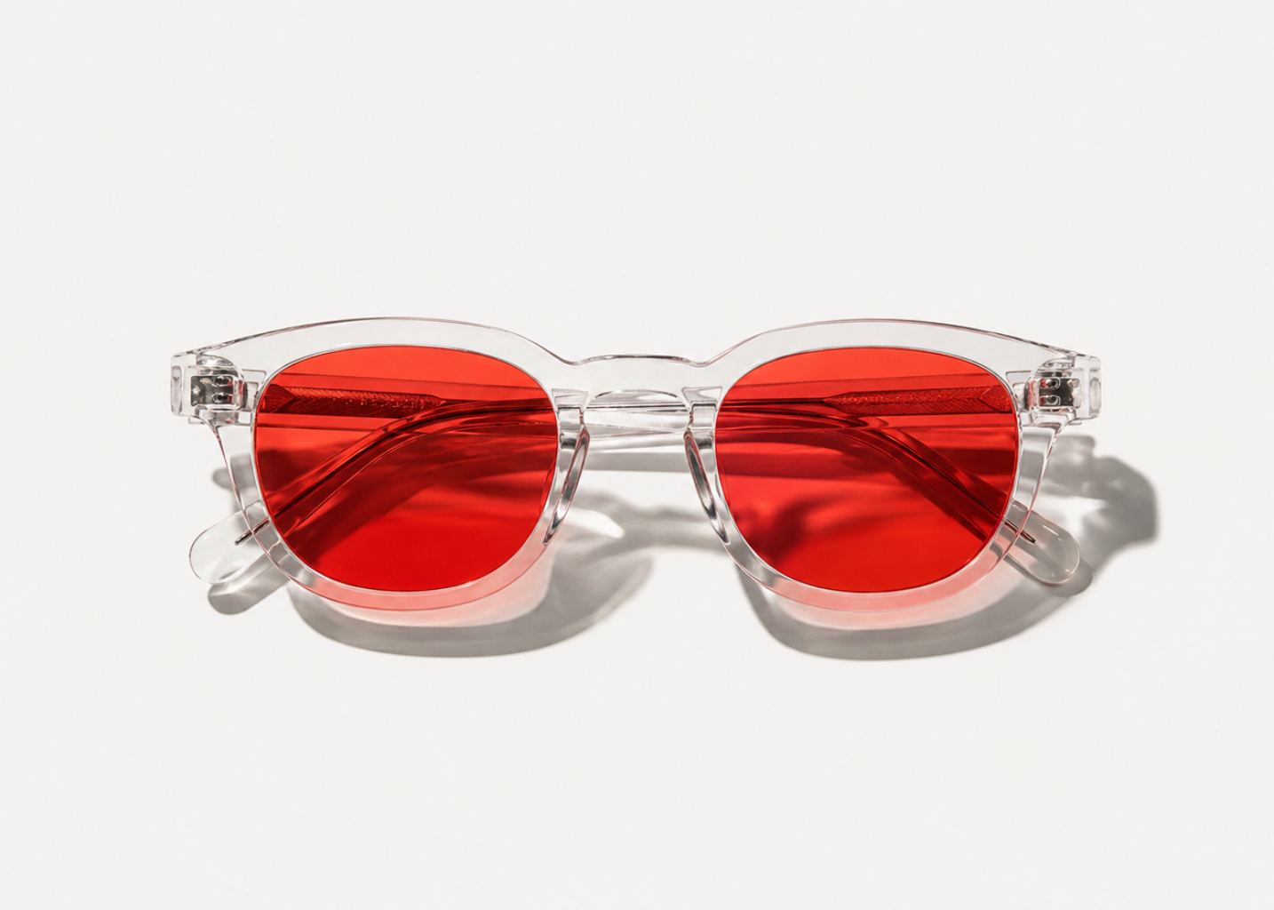 LUMA Red Lens Glasses Crystal Clear - front view folded