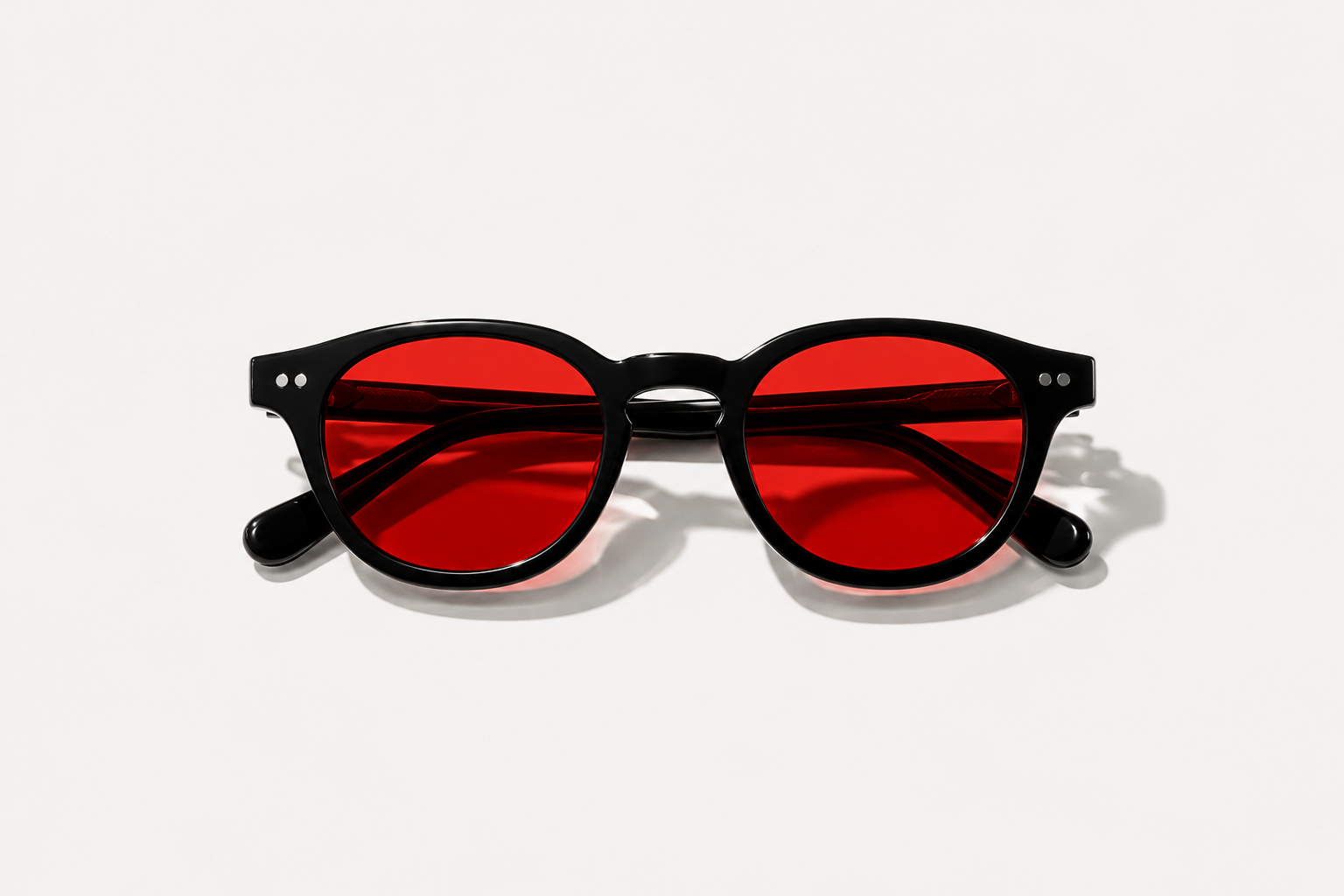 LUMA Eclipse™ front view – black frame with red lenses