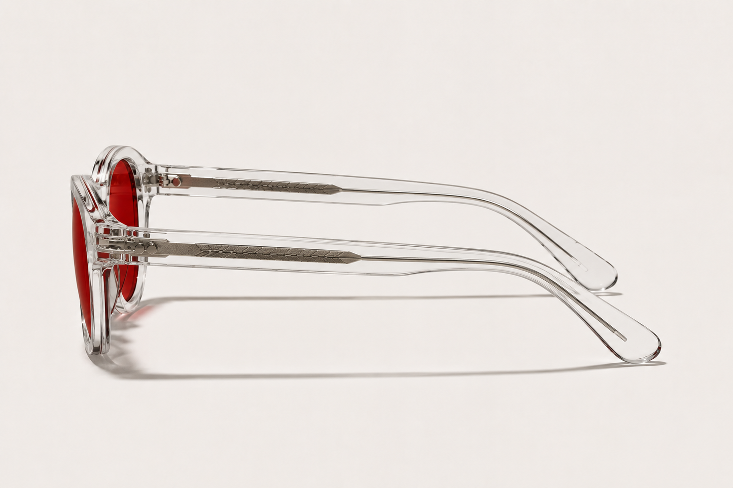 LUMA Red Lens Glasses Crystal Clear - three quarter angle view